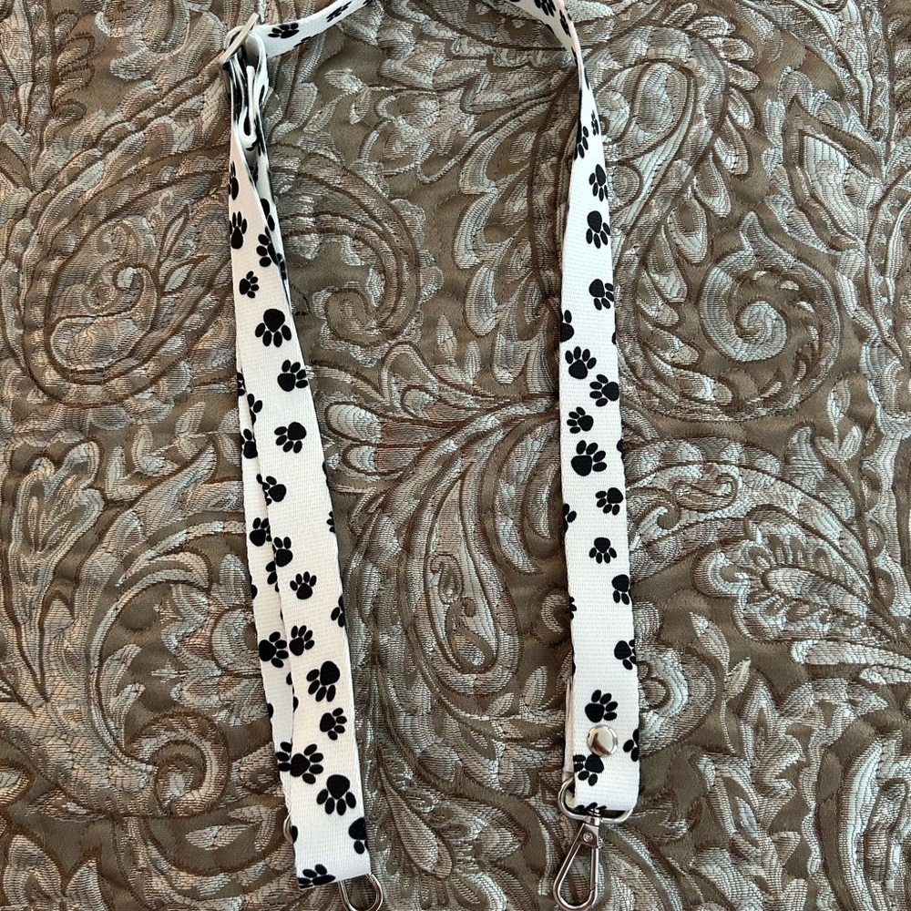 White Strap with Black Paw Prints Adjustable with Hooks on Each End